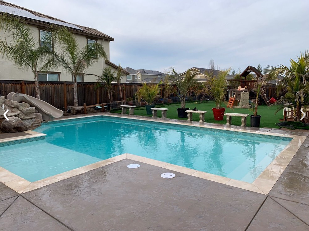 The photo shows the finished pool deck work in Diamond Bar.