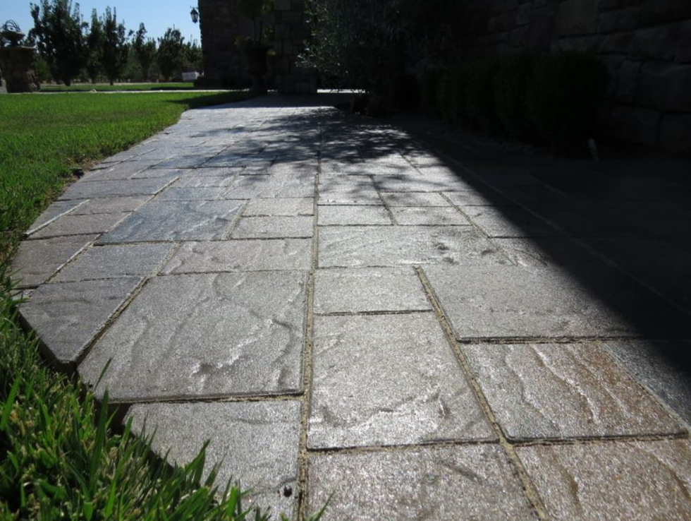 The photo shows the finished stamped concrete work in Diamond Bar.